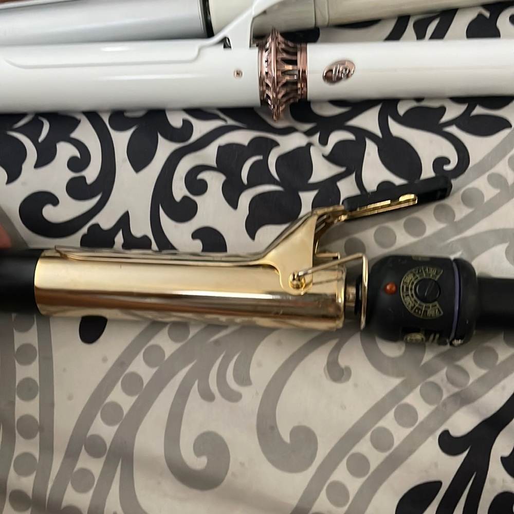 Hot told curling iron barely used. Might be 1.25 inches.
